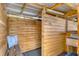 Rustic outdoor shower showcasing wood paneling, offering a refreshing experience with a sink at 832 E 4Th St, Englewood, FL 34223