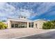 Inviting exterior of building featuring covered entrance, beautiful landscaping and convenient parking at 8407 Placida Rd # 205, Placida, FL 33946