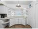 Compact kitchen nook with white cabinets and countertop space ideal for a breakfast bar or meal preparation at 941 Allen Ave, Englewood, FL 34223