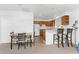 Inviting space featuring a dining area, bar seating, and a well-equipped kitchenette for relaxed living at 941 Allen Ave, Englewood, FL 34223