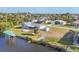 Wide aerial view of property with waterfront and canal at 15184 Aldama Cir, Port Charlotte, FL 33981
