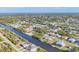 Panoramic aerial view of waterfront homes with canals and easy water access at 15184 Aldama Cir, Port Charlotte, FL 33981
