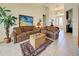 Cozy living room with comfortable seating, beach themed decor, and ample natural light at 1078 Boundary Blvd, Rotonda West, FL 33947