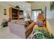 Comfortable living room with cozy seating and sliding doors leading to the patio at 1078 Boundary Blvd, Rotonda West, FL 33947