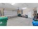 Spacious garage with room for parking, storage, and hobbies featuring an automatic door at 1080 Boundary Blvd, Rotonda West, FL 33947