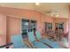 Relaxing lanai with comfortable lounge chairs, a dining area, and sliding glass doors to the home at 1080 Boundary Blvd, Rotonda West, FL 33947