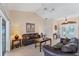 Spacious living room with vaulted ceilings and tile flooring at 1080 Boundary Blvd, Rotonda West, FL 33947