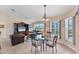 Inviting living room features ample natural light, comfortable seating, and views of the lake at 1080 Boundary Blvd, Rotonda West, FL 33947