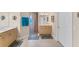 Spacious bathroom with double vanities, tiled floors, a walk-in shower, and neutral color scheme at 1080 Boundary Blvd, Rotonda West, FL 33947