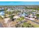Aerial view of a coastal community with lush greenery and picturesque waterways at 1141 Andrews St, Englewood, FL 34224