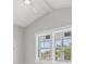 Bedroom with large windows with plantation shutters at 1141 Andrews St, Englewood, FL 34224