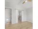 Spacious primary bedroom with wooden floors and en-suite bathroom at 1141 Andrews St, Englewood, FL 34224