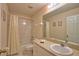 Bathroom with a shower-tub combination and ample counter space with sink at 116 Albatross Rd, Rotonda West, FL 33947