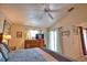 Comfortable main bedroom with a ceiling fan and sliding glass doors at 116 Albatross Rd, Rotonda West, FL 33947