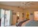 View of main bedroom showcasing sliding glass doors and a ceiling fan at 116 Albatross Rd, Rotonda West, FL 33947