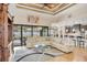 Spacious living room featuring a tray ceiling and open layout with outside view at 14527 Maysville Cir, Port Charlotte, FL 33981