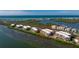Waterfront condominiums with community pool enjoy stunning bay views on a clear, sunny day at 1551 Beach Rd # 412, Englewood, FL 34223