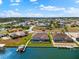 Waterfront home with pool, boat dock, and beautiful landscaping at 15588 Ruston Cir, Port Charlotte, FL 33981