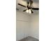 Bright bedroom features a ceiling fan and closet offering comfort and functionality at 15968 Honeysuckle St, Port Charlotte, FL 33953