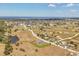 An aerial view reveals a coastal community with waterfront homes and serene waterways at 16489 Trading Post Rd, Punta Gorda, FL 33955