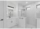 Elegant bathroom featuring marble tile, glass shower, and modern vanity at 1826 Narrington Ave, North Port, FL 34288