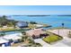 Aerial view of canal front homes with boat docks and waterway in the distance at 1905 Pennsylvania Ave, Englewood, FL 34224