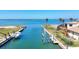 View of canal with docks and boat lift on a sunny day at 1905 Pennsylvania Ave, Englewood, FL 34224