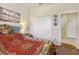 Serene bedroom with a bed, closet, and relaxing atmosphere, perfect for rest and relaxation at 20171 Tesoro Dr, Venice, FL 34293