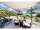Secluded patio area with comfortable seating offering a relaxing outdoor space at 2033 Georgia Ave, Englewood, FL 34224