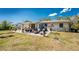 This backyard patio area offers a great space for outdoor lounging at 2033 Georgia Ave, Englewood, FL 34224