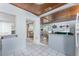Bright and airy kitchen leads into the living room and other areas of the home at 2033 Georgia Ave, Englewood, FL 34224