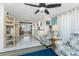 Inviting living room with bright decor, tiled floors, comfortable seating, and an open layout at 2033 Georgia Ave, Englewood, FL 34224