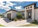 This attractive single-Gathering home features a garage, well-kept landscaping, and brick paver walkway at 212 Rotonda E Blvd, Rotonda West, FL 33947