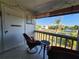Relaxing balcony with chairs overlooking the property at 22375 Edgewater Dr # F219, Port Charlotte, FL 33980