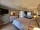 Cozy bedroom with a dresser, TV, and ample closet space at 22375 Edgewater Dr # F219, Port Charlotte, FL 33980