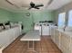 Bright laundry room featuring rows of well-maintained washers and dryers for residents' convenience at 22375 Edgewater Dr # F219, Port Charlotte, FL 33980
