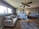 Inviting living room with lots of light and comfortable seating at 22375 Edgewater Dr # F219, Port Charlotte, FL 33980