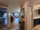 View of the open-plan living area adjacent to kitchen featuring modern decor and ample light at 22375 Edgewater Dr # F219, Port Charlotte, FL 33980
