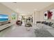 Staged living room showcasing a spacious layout and neutral color palette at 234 Cougar Way, Rotonda West, FL 33947
