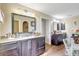 Bathroom featuring double vanity sinks with granite counters, and ample space at 2700 Sheboygan Ave, North Port, FL 34286