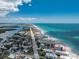 Scenic aerial view showcasing the condo's prime beachfront location, near the turquoise ocean and local amenities at 2792 N Beach Rd # 301, Englewood, FL 34223