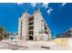 Stylish condo building with multi-level balconies, attractive architecture, and convenient access to the beach at 2792 N Beach Rd # 301, Englewood, FL 34223