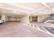 Spacious parking area with brick flooring, ample lighting, and clearly marked parking spaces for residents at 2792 N Beach Rd # 301, Englewood, FL 34223