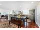 Bright and airy kitchen offering modern appliances, a center island, and easy access to dining and living areas at 2792 N Beach Rd # 301, Englewood, FL 34223