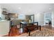 Well-equipped kitchen boasting stainless steel appliances, and a large center island for meal preparation at 2792 N Beach Rd # 301, Englewood, FL 34223