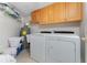 Well-equipped laundry room featuring modern washer and dryer at 2792 N Beach Rd # 301, Englewood, FL 34223