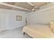 Bedroom with wood ceiling, tile floors and double door closet at 2980 N Beach Rd # Gv16, Englewood, FL 34223
