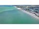 Stunning coastline showcasing beachfront homes along a tranquil turquoise ocean at 301 S Gulf Blvd # 419, Placida, FL 33946