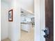 Inviting home interior showcasing a modern kitchen with sleek countertops and white cabinetry at 301 S Gulf Blvd # 419, Placida, FL 33946