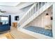 Cozy staircase with under-stair seating and a nautical theme at 301 S Gulf Blvd # 419, Placida, FL 33946